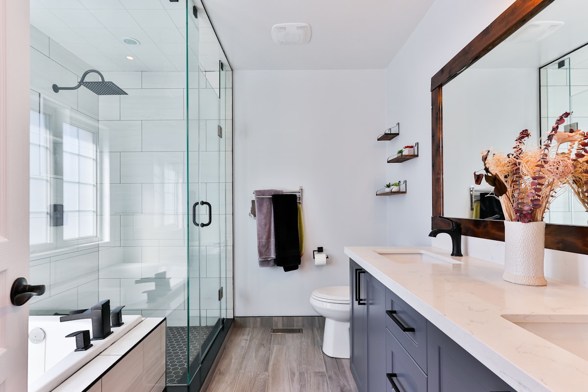 Modern residential bathroom with warm recessed lighting
